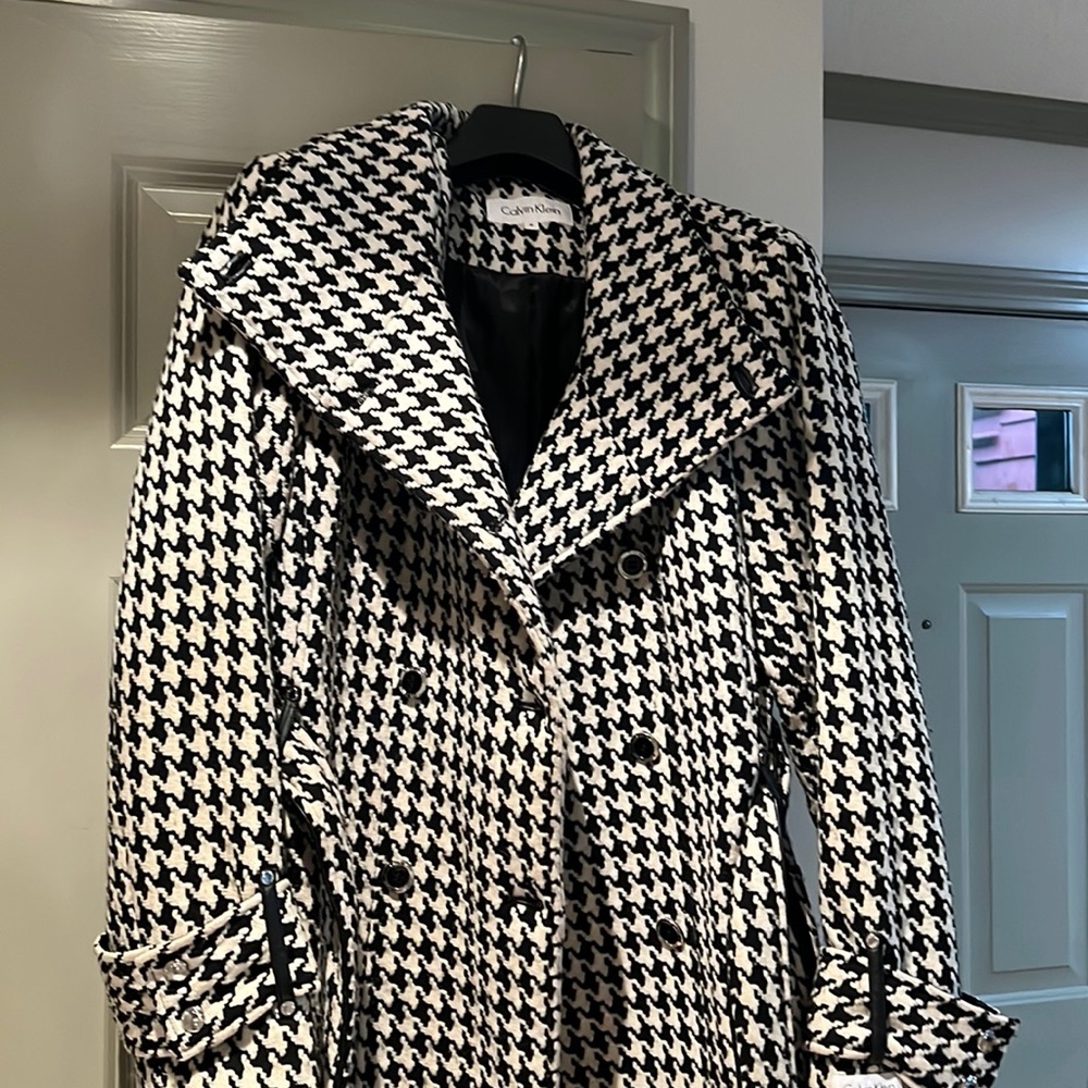 Calvin Klein… beautiful black and white belted wrap coat fully lined. Worn twice